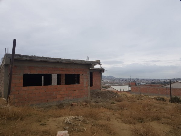 VENTA TERRENO CON VIVIENDA EN OBRA