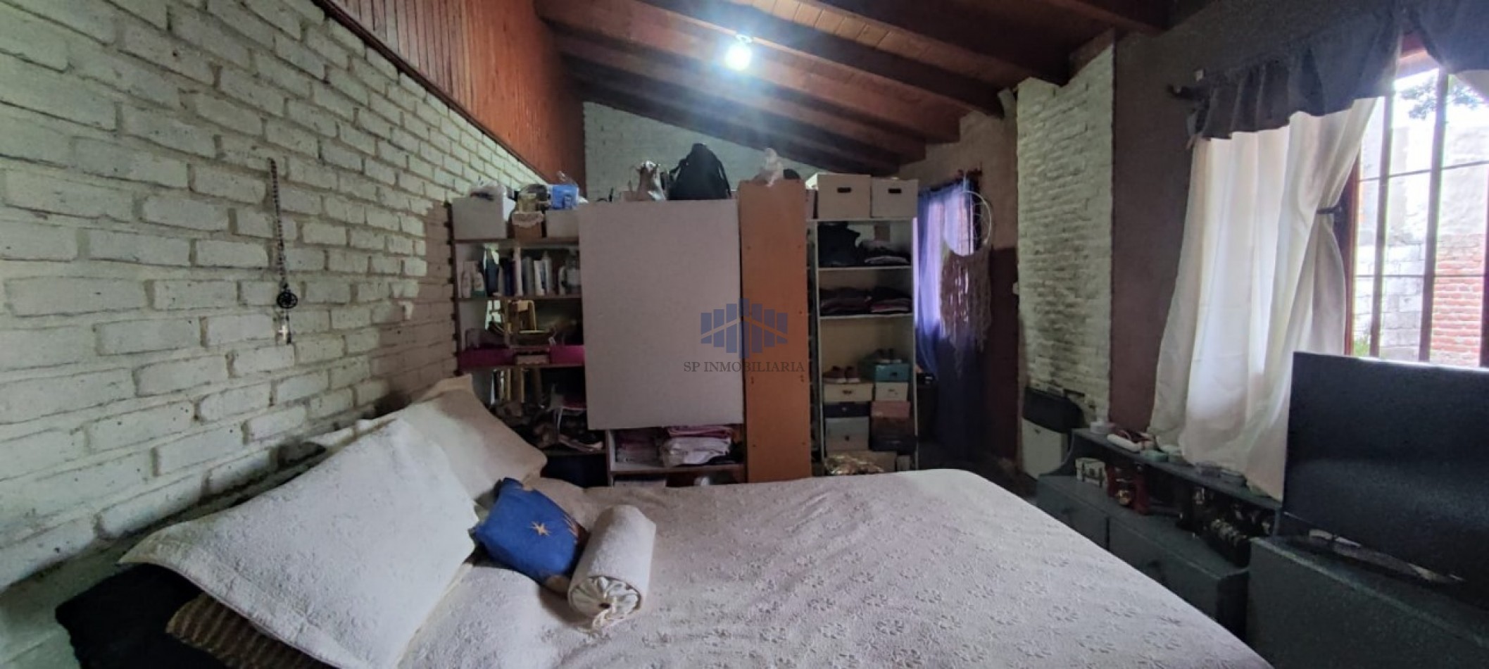 VENTA DE VIVIENDA CON LOCAL COMERCIAL EN TRELEW